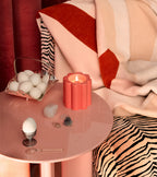 شمعة كانديلا برائحة شجرة التين في وعاء خزفي وردي فاتح