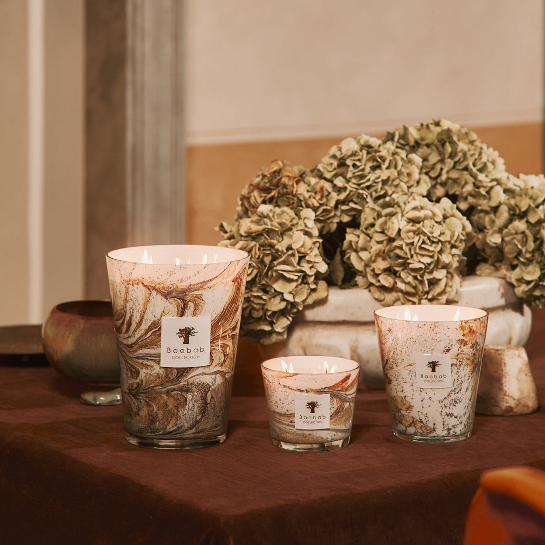Baobab Collection Leaves Naïs 4-wick scented candle in mouth-blown glass, 1.1kg, styled in a room setting
