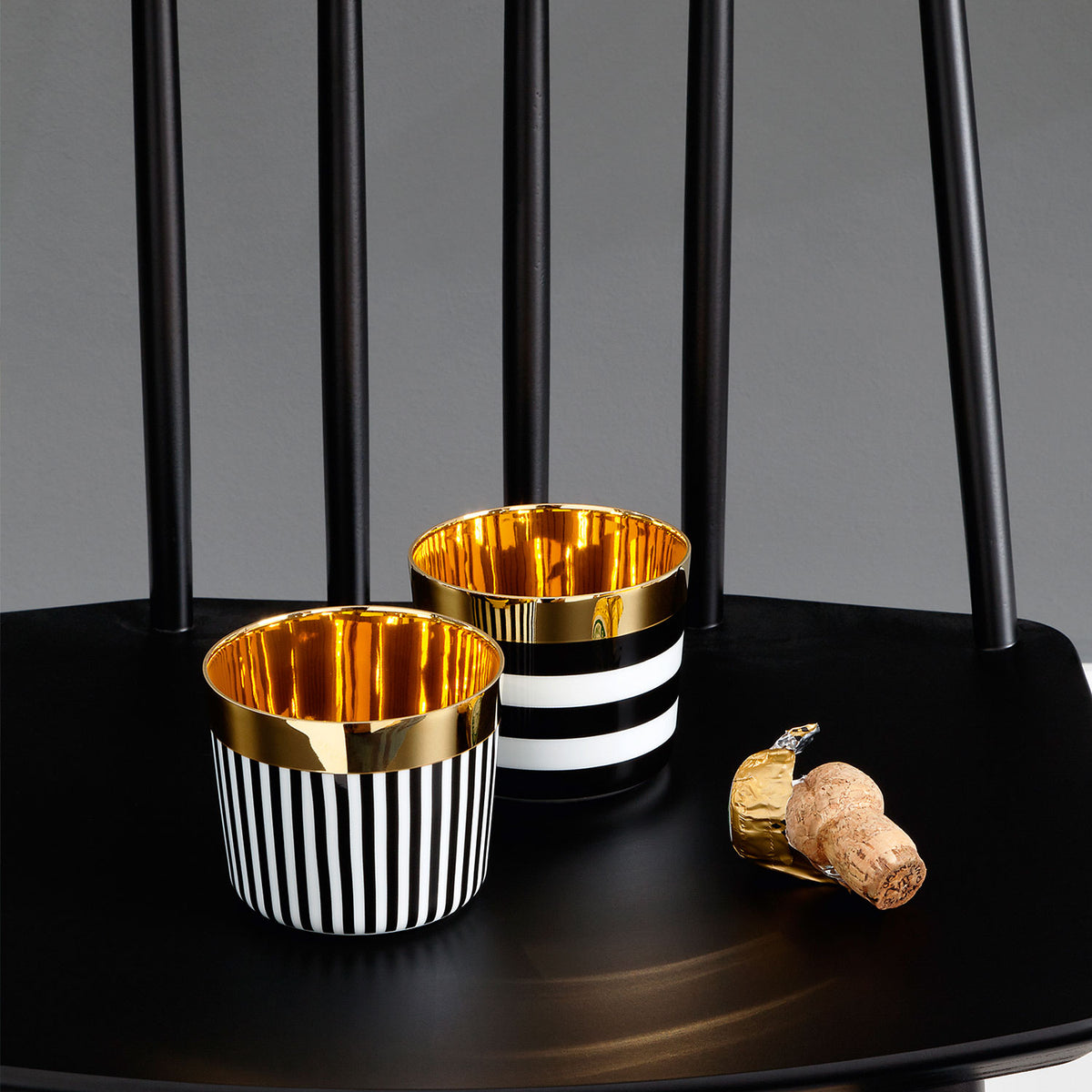 Sieger by Fürstenberg Sip-of-Gold Vertical Stripes Champagne Goblet, styled in a table setting