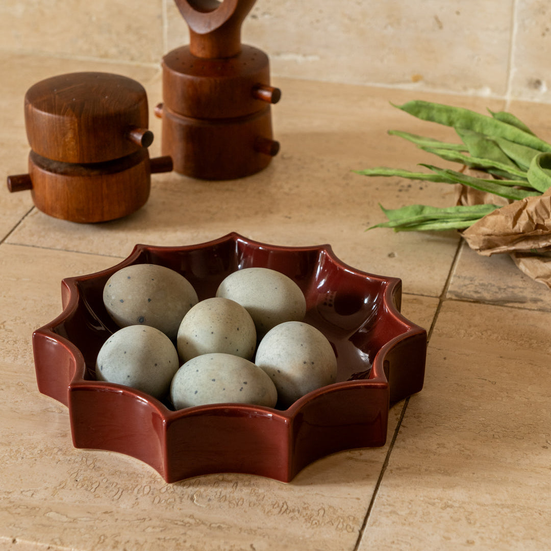 The Socialite Family Tasca décor tray in burgundy glazed ceramic, 22cm, styled in a room setting